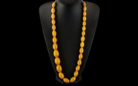 Amber Bakelite Necklace. Early 20th Century beaded necklace, weight 101 grams.