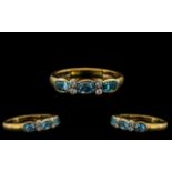 18ct Gold - Attractive Aquamarine and Diamond Set Ring of Pleasing Design.