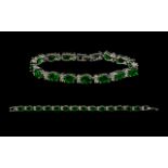 Emerald And Silver Tennis Bracelet. Fully Hallmarked For 925 Silver.
