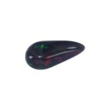 A Ethiopian Ruby Red Pear Shaped Opal length 20mm x 10mm x 5mm. Est carat weight 3.85.