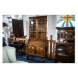 1930s Oak Jocobean Style Bureau Bookcase with a glazed top,