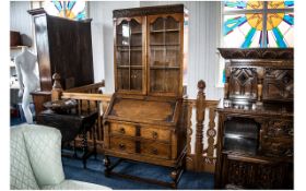 1930s Oak Jocobean Style Bureau Bookcase with a glazed top,