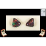 Lightning Ridge Loose Black Opals. A pair of natural black Opals . 2.97 cts, Triangular free form,