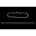 A 9ct Gold Tennis Bracelet marked 375