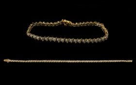 A 9ct Gold Tennis Bracelet marked 375