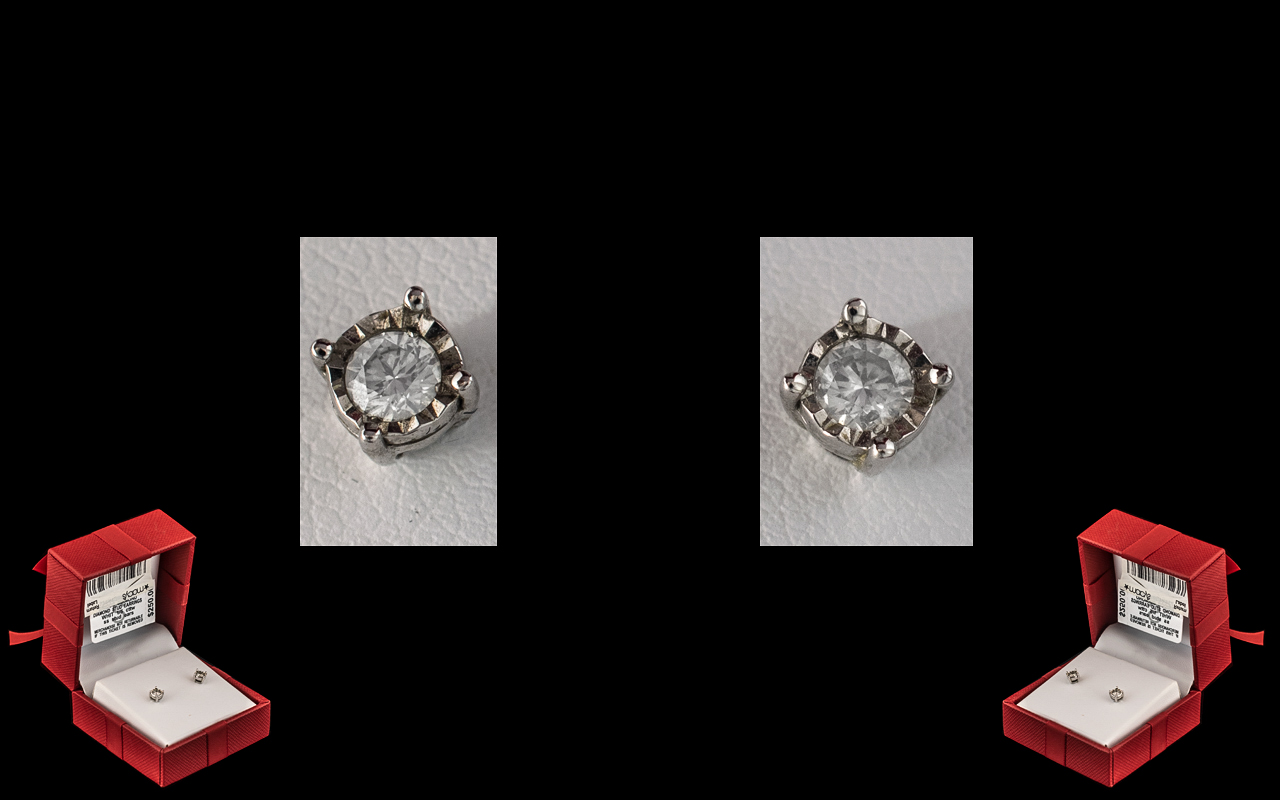 18ct White Gold Pair of Diamond Set Stud Earrings. Marked 18ct.