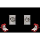 18ct White Gold Pair of Diamond Set Stud Earrings. Marked 18ct.