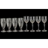 A Collection of Eight Waterford Drinking Glasses - comprising two sets of four cut glass wine
