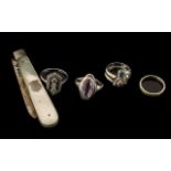Four Vintage Silver Rings with amethysts and marcasites,