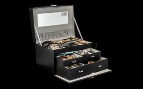 Large Collection of Vintage Costume Jewellery housed in an attractive black leather jewellery box.