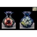 Moorcroft Pair of Small Tubelined Bulbous Shaped Vases 'Clematis' and 'White Hibiscus' design on