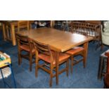 Teak Table With Pull Out Extending Leaf in the G Plan style, measures 57" in length,