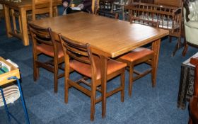 Teak Table With Pull Out Extending Leaf in the G Plan style, measures 57" in length,