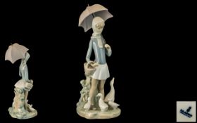 Lladro - Hand Painted Porcelain Figure ' Girl with Umbrella and Geese ' Model No 4510.