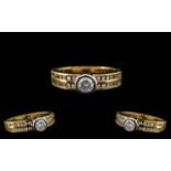 18ct Two Tone Gold Attractive Diamond Set Dress Ring of Contemporary Design.