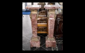 Pair of Reproduction French Style Rouge Marble Pedestals, ormalu mounted of square form.