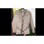 Burberry of London Ladies Jacket, beige, diamond quilted style with belt, two flap pockets, and