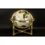 A Reproduction Table Brass Mounted World Globe, gem set style,