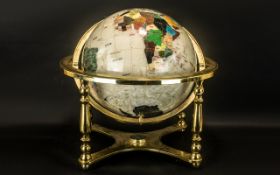 A Reproduction Table Brass Mounted World Globe, gem set style,