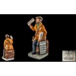 Royal Doulton Ltd and Numbered Edition Hand Painted Porcelain Figure ' The News Vendor ' Gold and