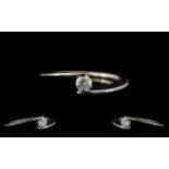 Ladies Contemporary Design 18ct White Gold Single Stone Diamond Ring the round brilliant cut