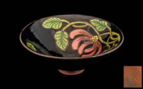 Early William Moorcroft Style Dish, imprinted WM to base, black ground with honeysuckle design,