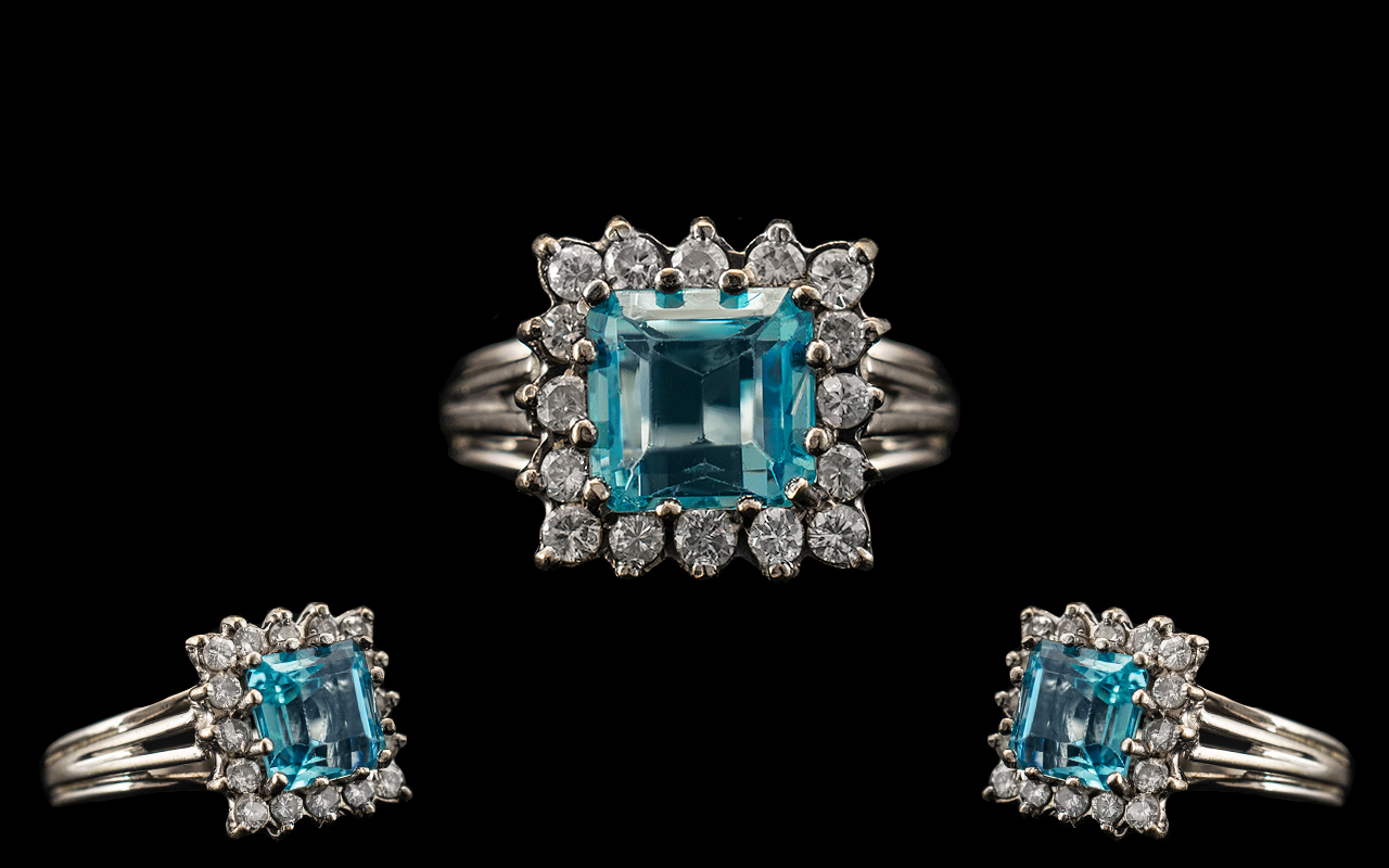 18ct White Gold Attractive Diamond and Aquamarine Set Dress Ring of Square Form. Marked 18ct.