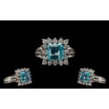 18ct White Gold Attractive Diamond and Aquamarine Set Dress Ring of Square Form. Marked 18ct.