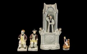 Staffordshire 'Clock' Figure of John Wesley, 12 inches (30cms) high,