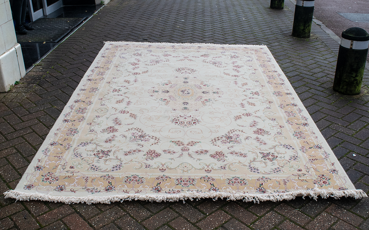 A Genuine Excellent Quality Iranian Cream Ground Carpet/Rug. Decorated throughout in a bespoke