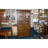 'Old Charm' Carved Oak Glazed Top Cabinet in the Jacobean style, with a leaded glass top,