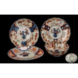 Four Antique Imari Dishes comprising a pair of Lobed shaped plates 7'' diameter; a fluted Imari
