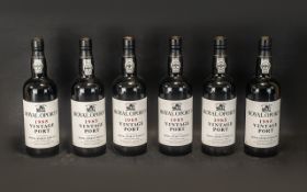 Collection of Six Bottles of Royal Oporto 1985 Vintage Port, in their original wooden box,