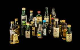 Box Containing Eighteen Miniature Whisky Bottles, various brands,