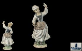 Lladro - Hand Painted Porcelain Figure ' Girl and Sparrow ' Model No 4758. Issued 1971 - 1979.