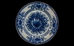 Delftware 18th Century Plate painted in the manner of an earlier Chinese Ming dish,