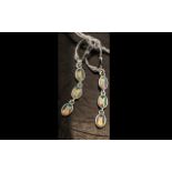 Natural Opal Triple Drop Earrings, each earring comprising three oval cut cabochons of natural opal,