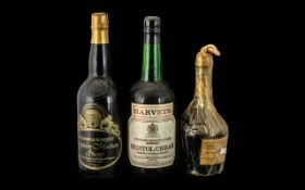 A Bottle of Harvey's Bristol Cream Sherry a bottle of Williams & Humbert Sherry; and a bottle of