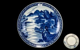 Large Antique Blue & White Chinese Charger depicting a mountainous river landscape with figures.