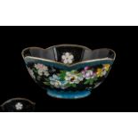 Chinese Cloisonne Shaped Bowl, decorated to the black enamel body with flowers and blossoms.