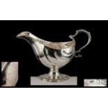 George III 1760 - 1820 Exceptional Silver Sauce Boat of Wonderful Nautalis Design and of Solid