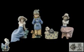 Nao by Lladro Collection of Hand Painted Porcelain Figures ( 4 ) In Total.