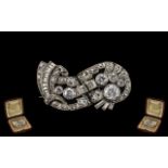 Art Deco Period 1930's Stunning Baguette and Brilliant Cut Diamond Set Brooch In Platinum.