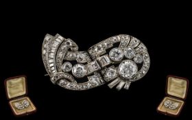 Art Deco Period 1930's Stunning Baguette and Brilliant Cut Diamond Set Brooch In Platinum.