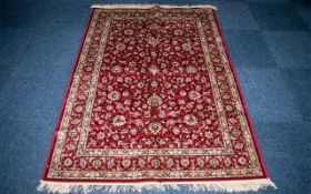 Red Cashmere Rug with all-over floral pattern and fringing. Measures 1.7 x 1.2 m.