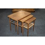 Nest of Three Interlocking Teak Tables, supported on round tapering legs,