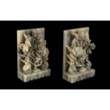 Pair of Chinese Grey Soapstone Bookends, carved as flowering roses on a ledge, c1930s,