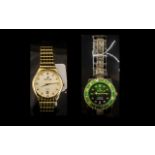 Two Gentleman's Fashion Watches comprising a Westar watch with a gold tone bracelet strap,
