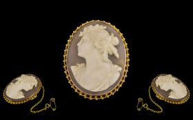 9ct Gold Mounted Oval Shaped Shell Cameo Brooch with Attached Safety Chain.