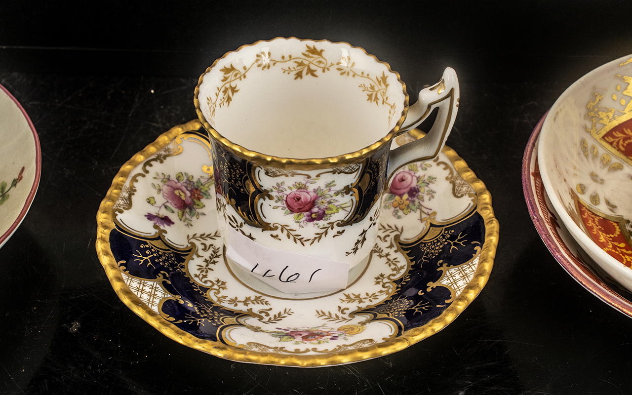 Coalport Cabinet Coffee Cup and Saucer, decorated with flowers, highlighted in gilt, - Image 2 of 2